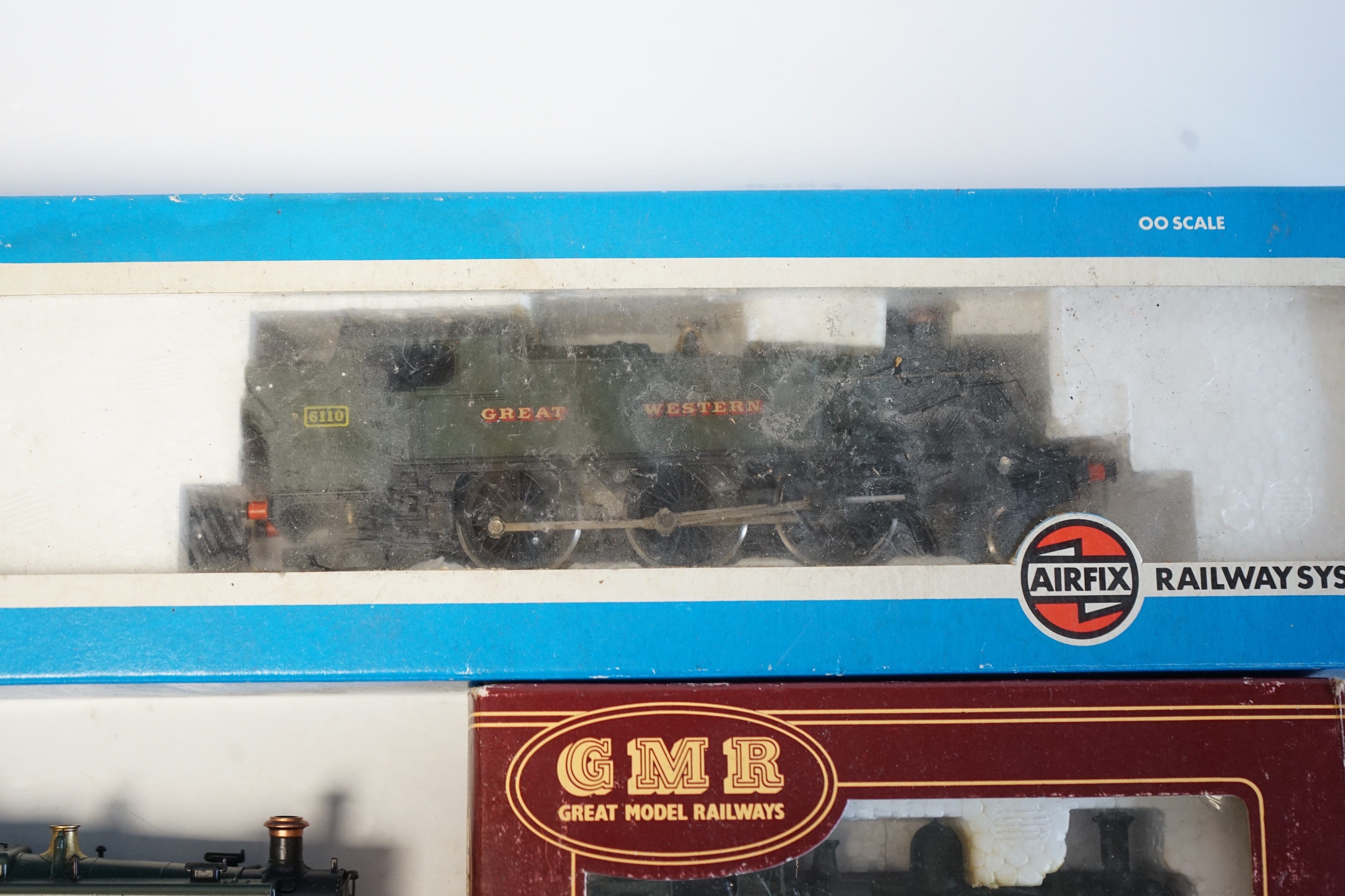 Three 00 gauge GWR steam locomotives by Lima and Airfix; a Prairie Tank locomotive, 6110, a Class 94xx loco and a Class 14xx. Condition - fair, two locos boxed